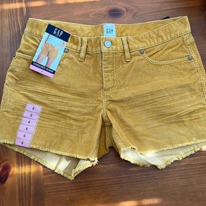 Golden yellow cutoff corduroy shorts
